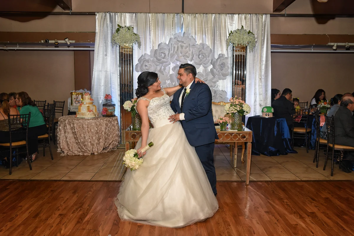 Bride and groom sharing their first dance at Selebracion Ballroom
